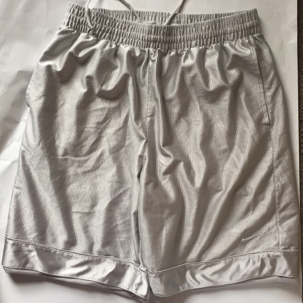 NIKE metallic silver L shorts